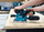 MAKITA Szlifierka oscylacyjna akumulatorowa 18V 3-biegi 2x5,0Ah DBO380RTJ
