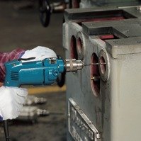 MAKITA 2-biegowa wiertarka bezudarowa 720 W DP4011